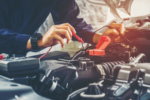 An auto electrical technician provides electrical troubleshooting and repair services on a customer's vehicle.